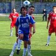 Nogometaši Oriolika (crveni) u utakmici sa Slavonijom Požega